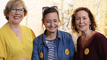3 smiling women