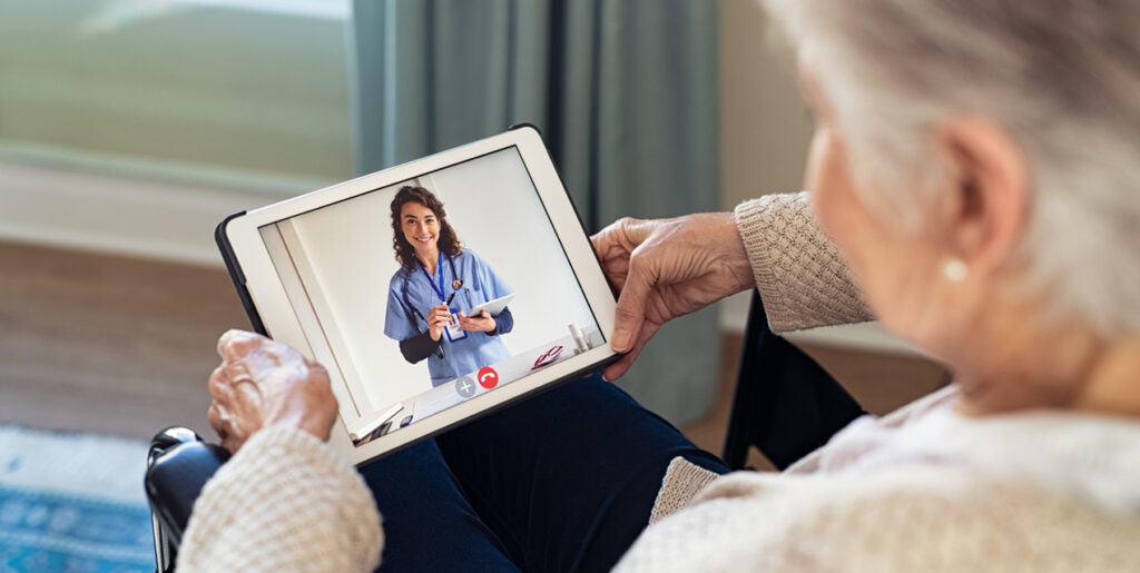 Elderly woman having a telehealth appointment with a nurse